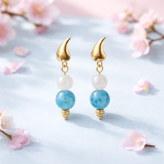 Earrings with Blue Jade Faceted Beads and White Quartz Gemstones suspended from an 18K GF Leaf Post 1.75”
