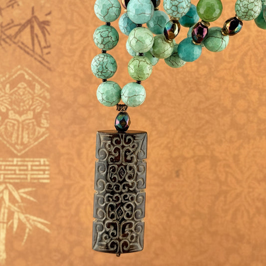 Turquoise Magnesite Necklace with Carved Pendant 29”