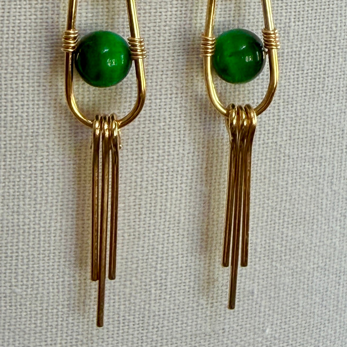 Green Tigereye Earring nestled in a Wire-wrapped Frame with flun Fringe at the bottom | 3"