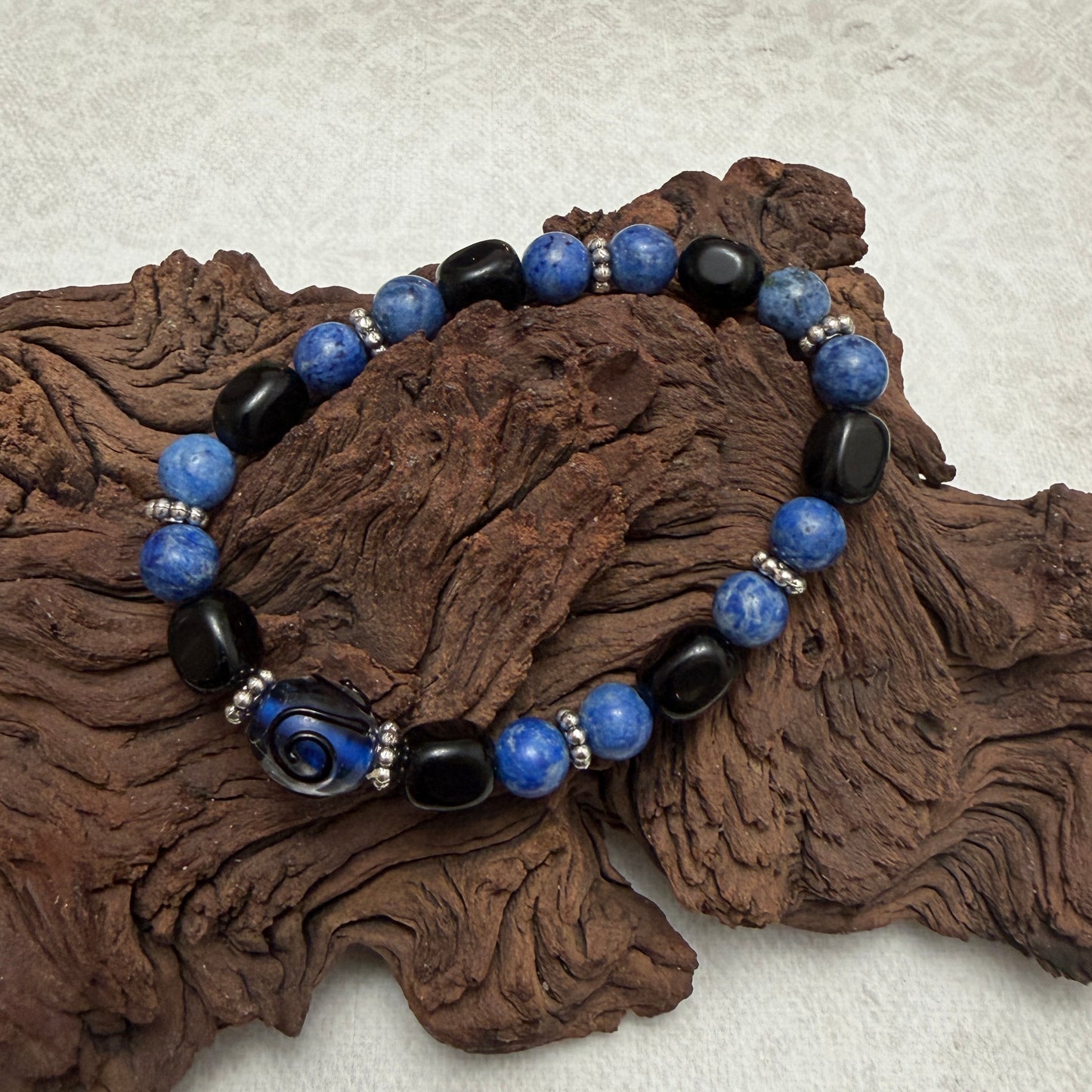 Bracelet | Blue Lampwork Focal | Sodalite | Onyx | Pewter Beaded Spacers | Stetch Cording