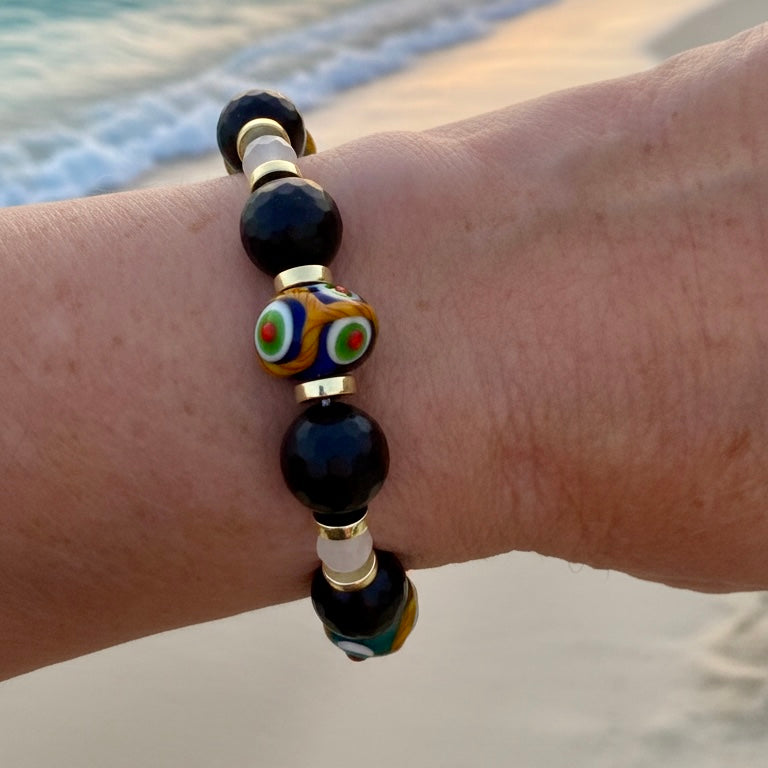 Bracelet | Onyx | Handmade Glass Beads | Faceted Onyx | Moonstone | 18K Gold-plated discs | Stretch