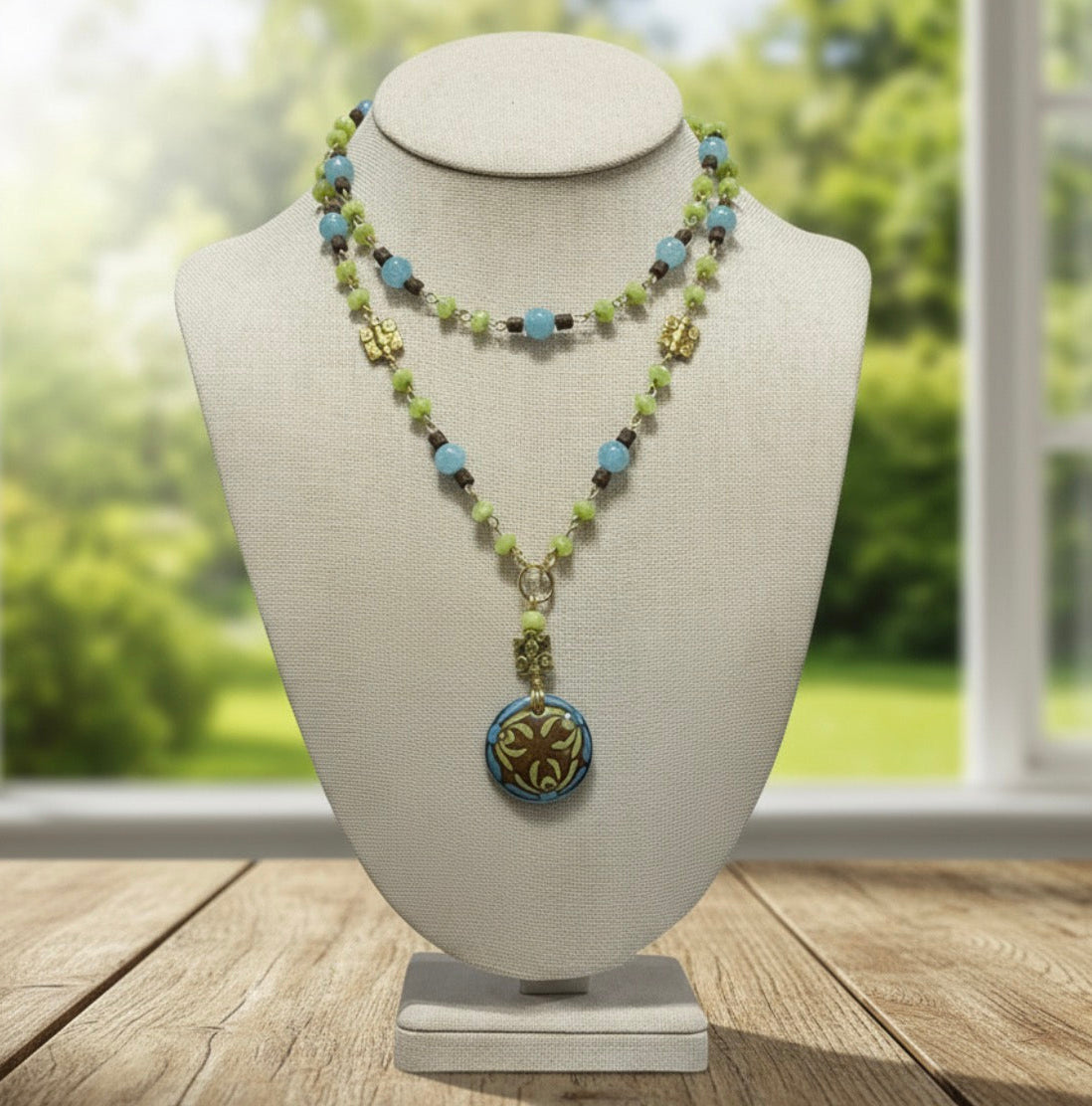 Multi-colored Necklace with Green Jade, Aquamarine, and Brown Wooden Beads with Enamel Pendant 30"