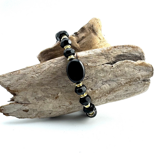 Bracelet | Onyx Faceted Rondells | 18K Gold-plated Saucer Beads | Oval Onyx Focal Bead