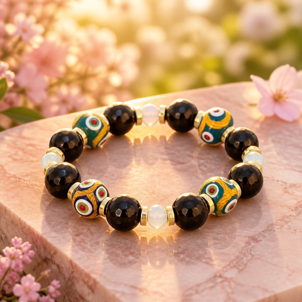 Bracelet | Onyx | Handmade Glass Beads | Faceted Onyx | Moonstone | 18K Gold-plated discs | Stretch