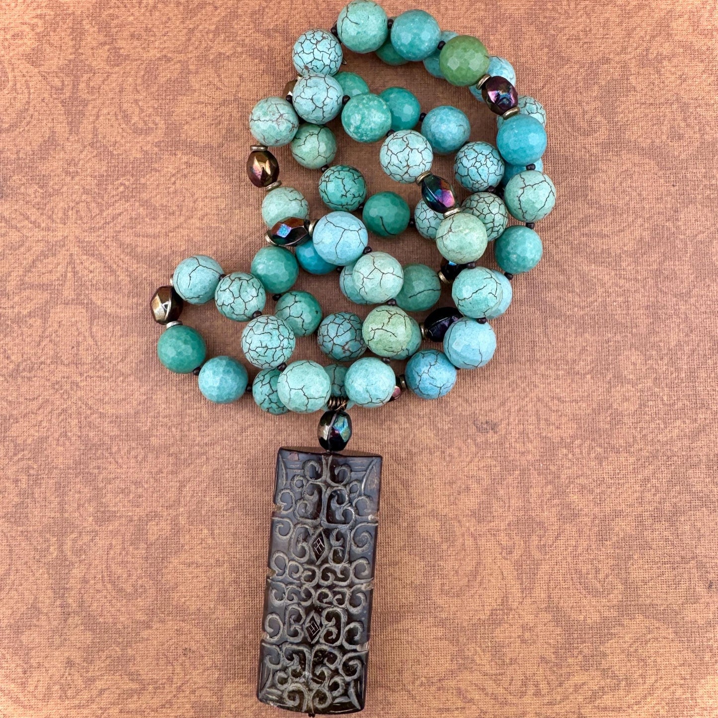 Turquoise Magnesite Necklace with Carved Pendant  29”